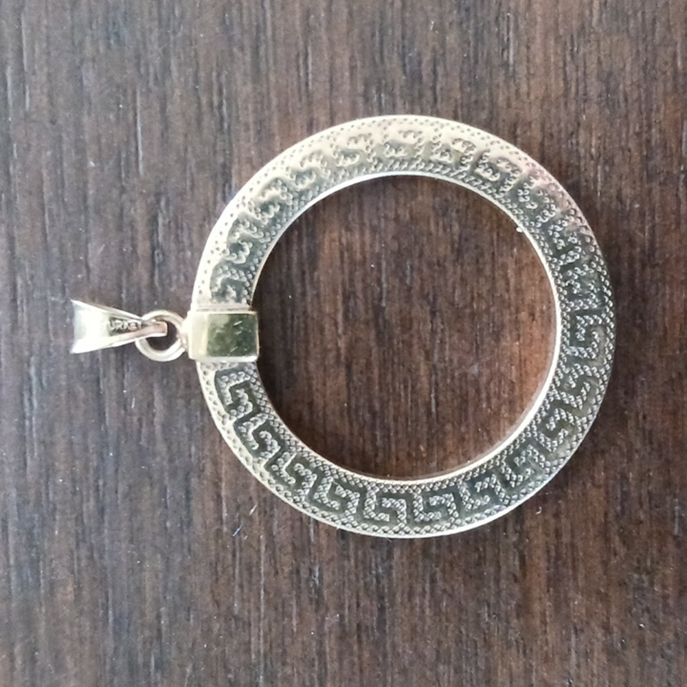 Elegant Gold-Tone Circular Pendant
